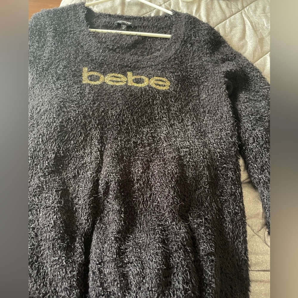 Original BEBE black sweater.